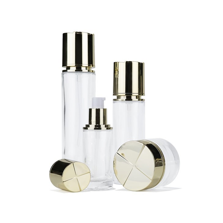 Clear Glass Skincare Set With Cross-hatched Gold Caps & Pump Dispenser